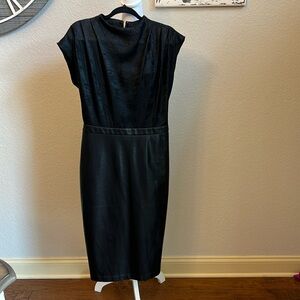 Express mixed media black dress. Bottom is vegan leather.